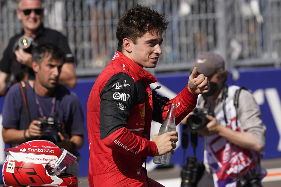 Ferrari driver Charles Leclerc of Monaco gives a thumbs up after finishing in pole position during qualifying for the Formula One Miami Grand Prix auto race at the Miami International Autodrome, Saturday, May 7, 2022, in Miami Gardens, Fla. (AP Photo/Darron Cummings)