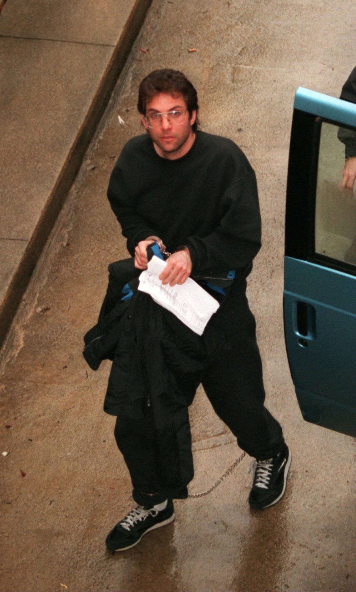 Kevin Mitnick, suspected computer hacker, makes his entrance at the US Courthouse in Raleigh in 1995 on charges of hacking.