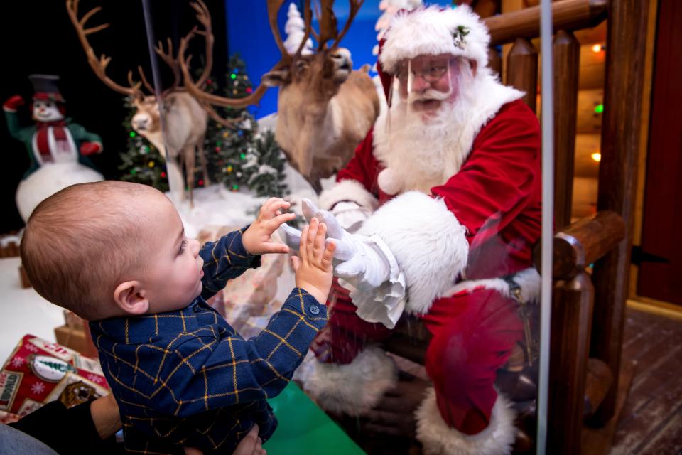 Santa Claus arrives for the holiday season Saturday at Cabela's.