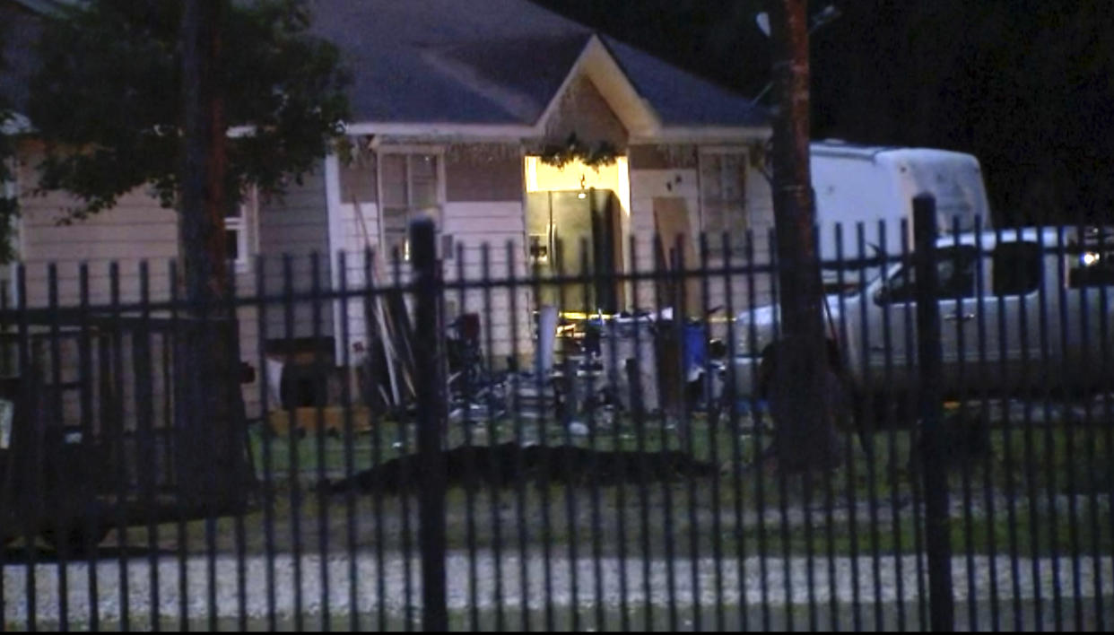 This image provided by KTRK shows the scene of a shooting early Saturday, April 29, 2023 in Cleveland, Texas. A man went next door with a rifle and began shooting his neighbors, killing several including an 8-year-old inside the house, after the family asked him to stop firing rounds in his yard because they were trying to sleep, authorities said Saturday. (KTRK via AP)