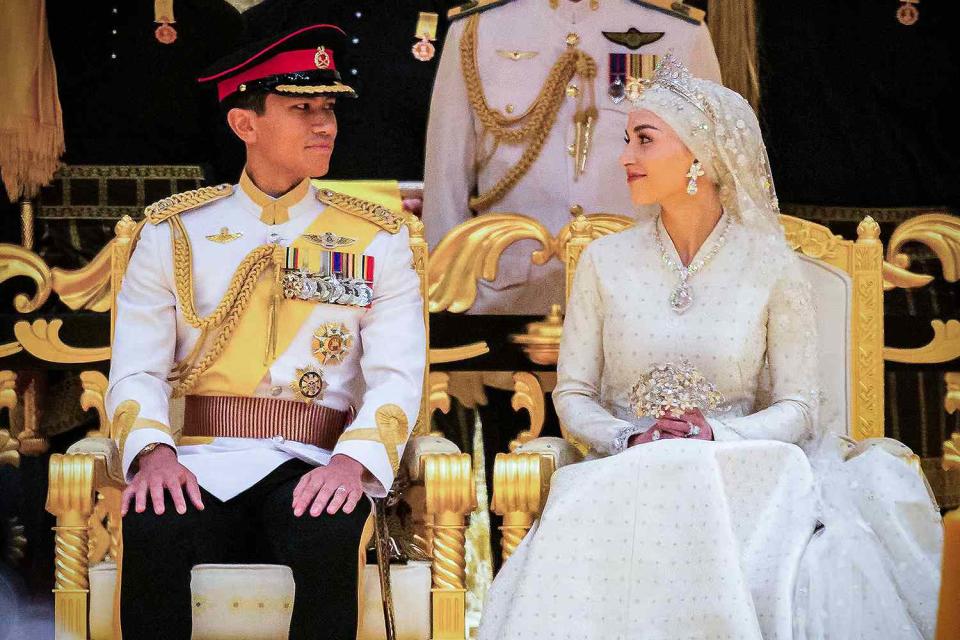 <p>IQBAL DATO HJ SELAMAT/AFP via Getty</p> Prince Abdul Mateen and Anisha at their wedding ceremony on Jan. 14, 2023