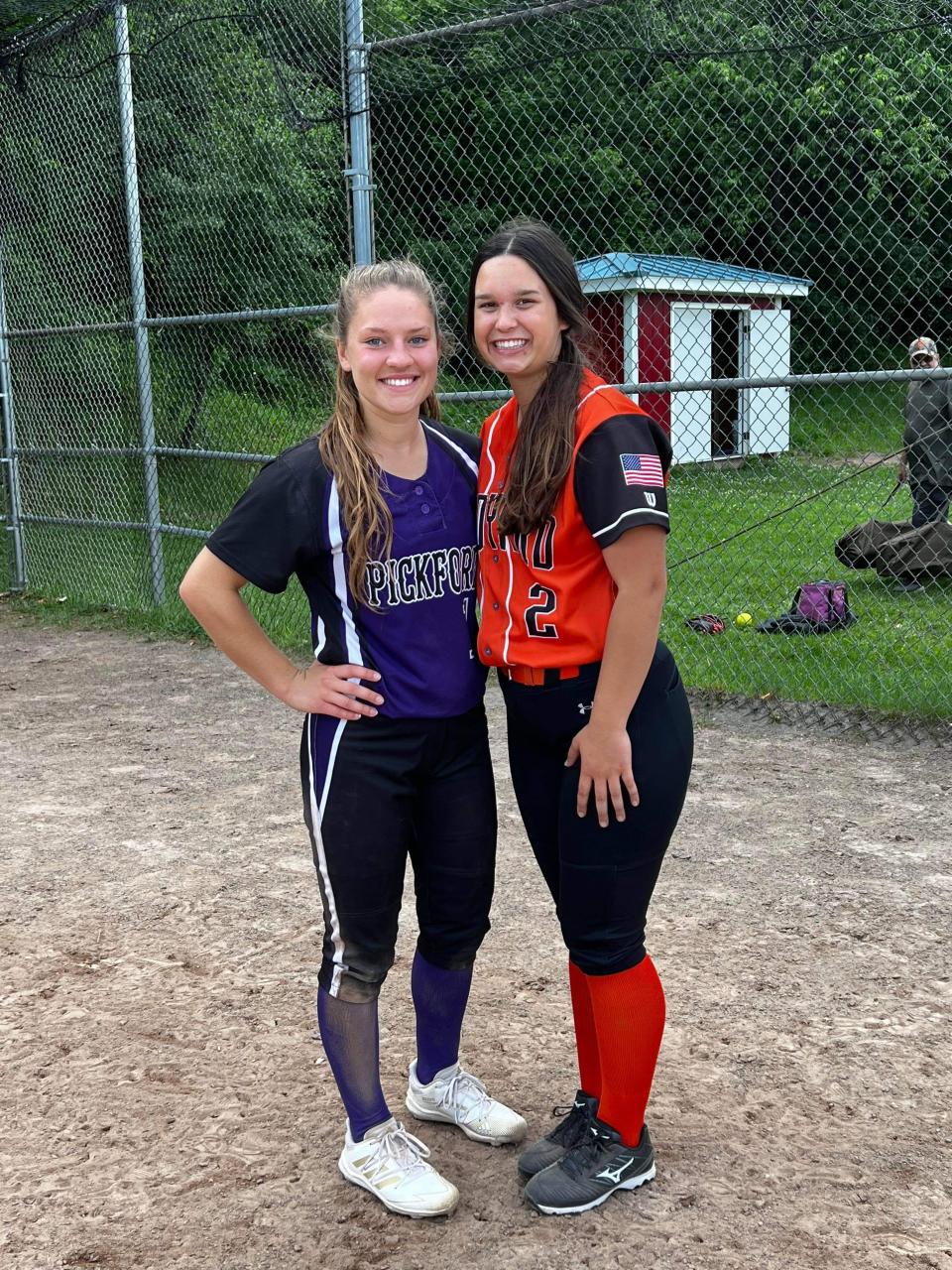 Lizzie Storey of Pickford and Delaney MacDowell of Rudyard are pictured at the U.P. All-Star Softball Game. They were both on Team 2, which won the game 14-7.