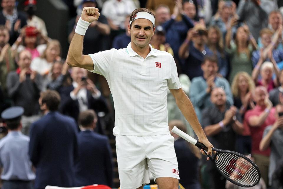 Roger Federer of Switzerland celebrates victory after winning his Men's Singles Fourth Round match against Lorenzo Sonego of Italy during Day Seven of The Championships - Wimbledon 2021 at All England Lawn Tennis and Croquet Club on July 05, 2021 in London, England.