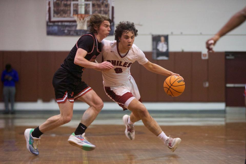 Chiles senior Jake Easterling (0) takes the ball to the hoop in a game between Leon and Chiles on Jan. 20, 2023, at Chiles High School. The Timberwolves won, 56-53.
(Photo: Jack Williams/Tallahassee Democrat)