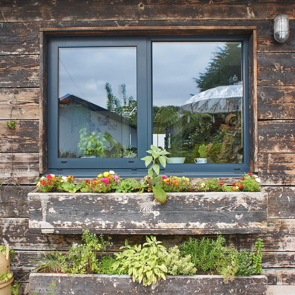 Fix planters under the kitchen window