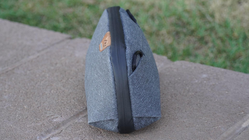 The Peak Design Small Tech Pouch outdoors.