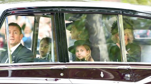 PHOTO: Prince George of Wales, Princess Charlotte of Wales, Catherine, Princess of Wales and Camilla, Queen consort are seen on The Mall ahead of The State Funeral for Queen Elizabeth II on Sept. 19, 2022 in London. (Anthony Devlin/Getty Images)