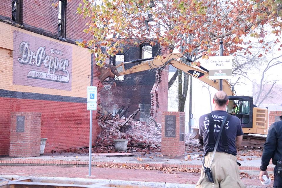 Just hours before Shawnee's annual Christmas parade Thursday, an unexpected twist to the downtown festivities flared up — a fire that ultimately resulted in immediate demolition. On the 500 block of Main Street, a building just west of the drive into the Santa Fe Depot caught fire mid-afternoon, causing Shawnee Fire Department crews to respond.