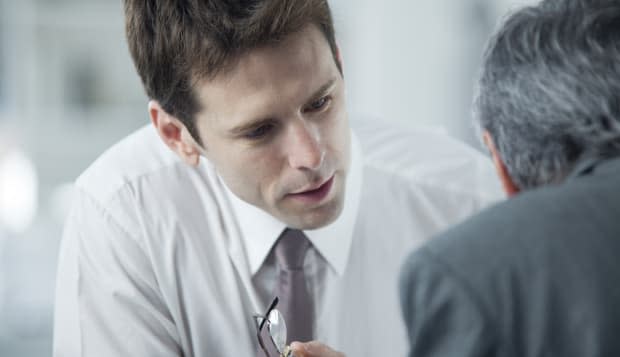 Businessmen discussing work