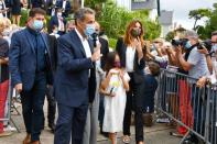 <p>Nicolas Sarkozy, son épouse Carla et leur fille Giulia, samedi à La Baule pour le mariage de Franck Louvrier. </p>