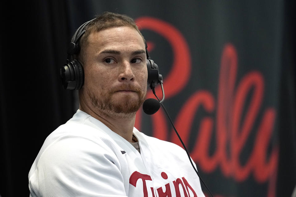 Minnesota Twins catcher Christian Vazquez speaks to media and fans during the baseball team's annual fan fest at Target Field Saturday, Jan. 28, 2023, in Minneapolis. (AP Photo/Abbie Parr)