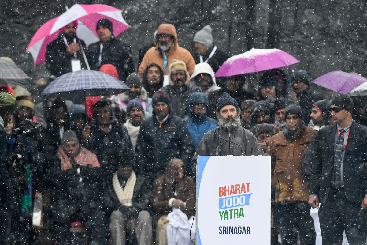 India’s Congress party leader Rahul Gandhi speaks at a public meeting amid heavy snowfall as he concludes the ‘Bharat Jodo Yatra’ march in Srinagar on 30 January 2023 (AFP/Getty)