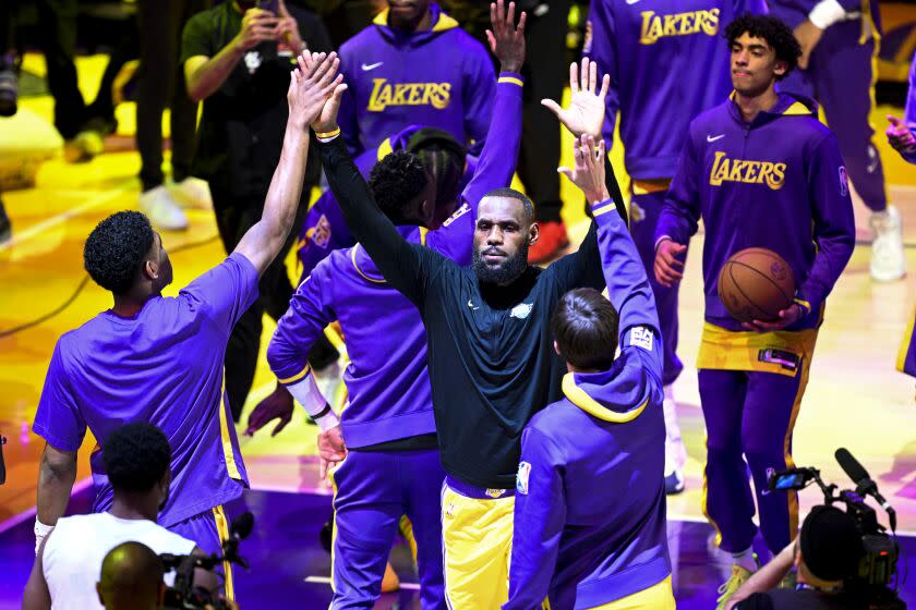 LOS ANGELES, CA - MAY 22: Los Angeles Lakers forward LeBron James, center, is introduced before game four in the NBA Playoffs Western Conference Finals against the Denver Nuggets at Crypto.com Arena on Monday, May 22, 2023 in Los Angeles, CA. (Gina Ferazzi / Los Angeles Times)