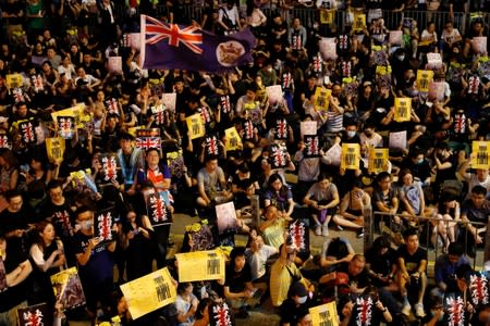 Anti-extradition bill protesters attend a rally calling on the British and U.S. governments to monitor the implementation of "one country two systems" principal, in Hong Kong