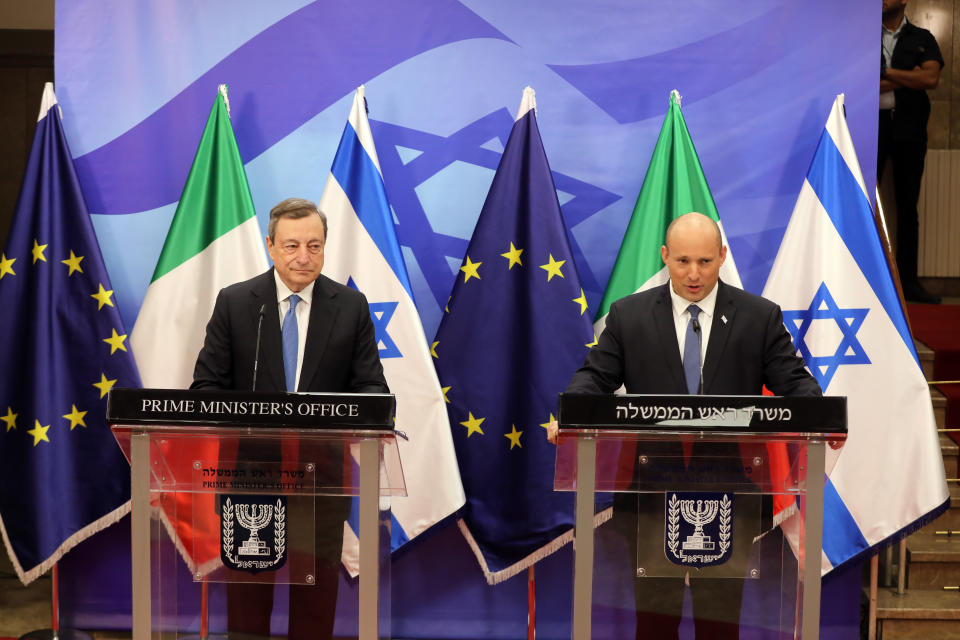 Italian Prime Minister Mario Draghi, left, and Israeli Prime Minister Naftali Bennett make a press statement at the prime minster's office in Jerusalem, Israel, Tuesday, June 14, 2022. Draghi is on two-day official visit to Israel and the Palestinian authority. (Abir Sultan/Pool via AP)