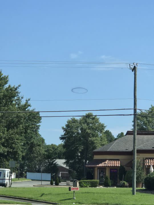 Mysterious Black Ring Captivates Residents in Williamsburg Sky