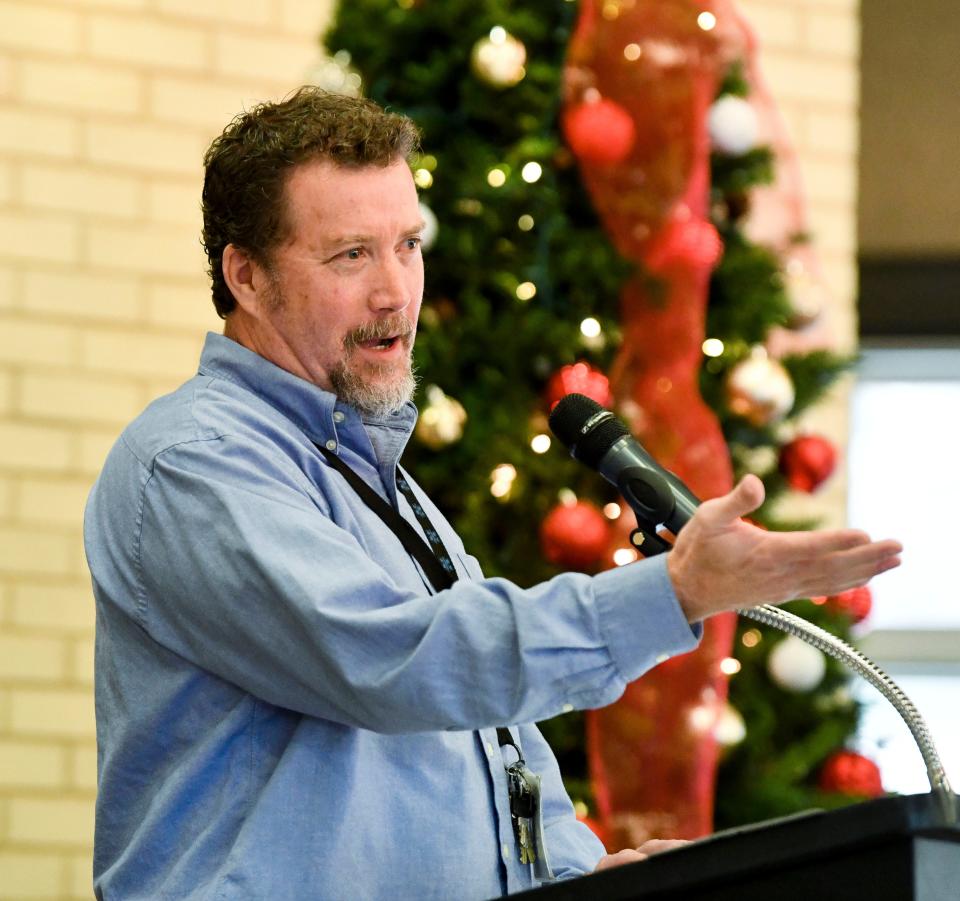 Dec 5, 2022; Tuscaloosa, Alabama, USA;  The Tuscaloosa City Schools presented the 2022 Apple Award Winners for teachers and support personnel at the Tuscaloosa River Market. Ryan Ballard was named one of the systems Alabama Teachers of the Year for his work at Northridge Middle School. He will represent the system at the state level of the competition.  