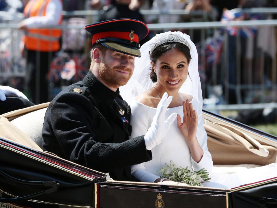 meghan markle and prince harry in their wedding carriage