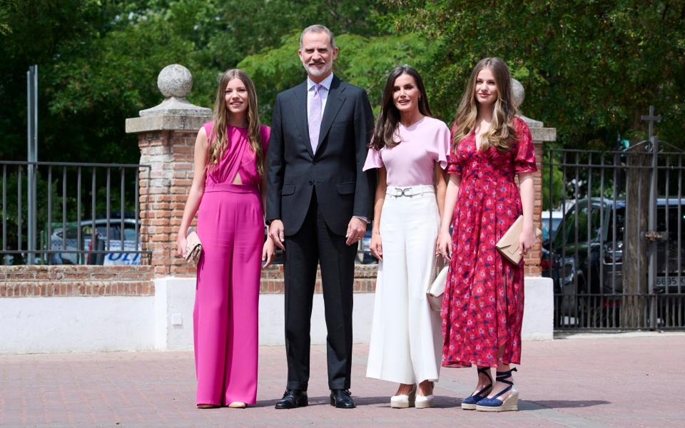 The Spanish royal family all wore pink for the confirmation of Princess Sofia (left) - Getty 
