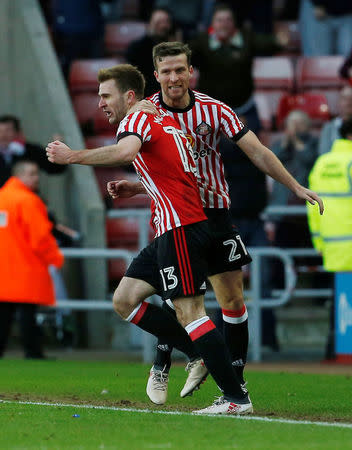 Soccer Football - Championship - Sunderland vs Middlesbrough - Stadium of Light, Sunderland, Britain - February 24, 2018 Sunderland's Callum McManaman celebrates scoring their third goal with team mates Action Images/Craig Brough