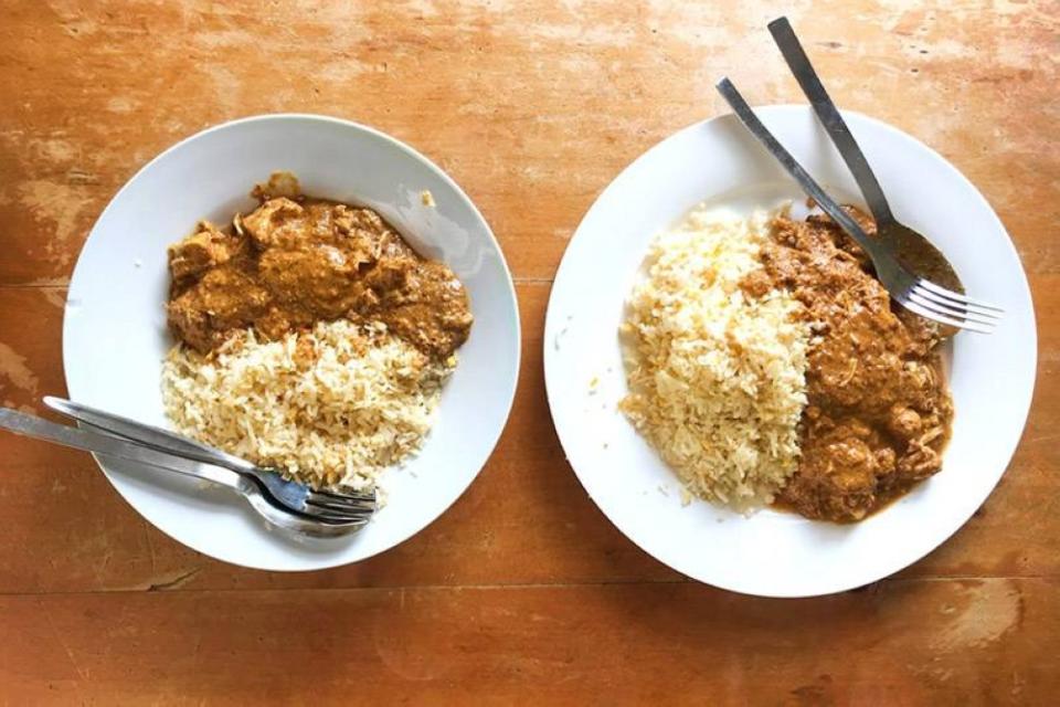 Ladle some of the creamy chicken curry on each plate of golden egg rice.