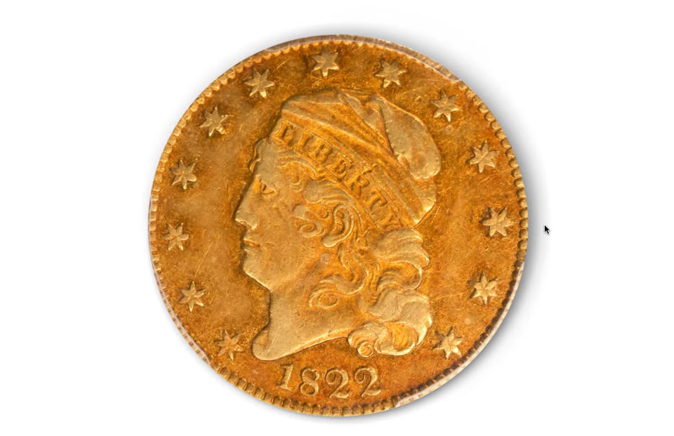 This image taken from video provided by Stack's Bowers Galleries shows a 1822 Half Eagle gold coin from the D. Brent Pogue Collection that was sold at Stack's Bowers Galleries in Las Vegas. The coin trading world has a new gold standard, after the only known 1822 half eagle $5 piece in private hands sold at auction in Las Vegas for $8.4 million, experts said Friday, March 26, 2021. (Stack's Bowers Galleries via AP)