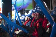 Revelers stand in Times Square ahead of New Year celebrations in New York December 31, 2012.