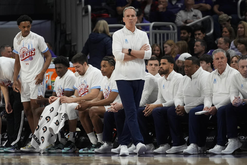 Northwestern coach Chris Collins watches from the sideline during the first half of the team's NCAA college basketball game against Michigan, Thursday, Feb. 22, 2024, in Evanston, Ill. (AP Photo/Erin Hooley)