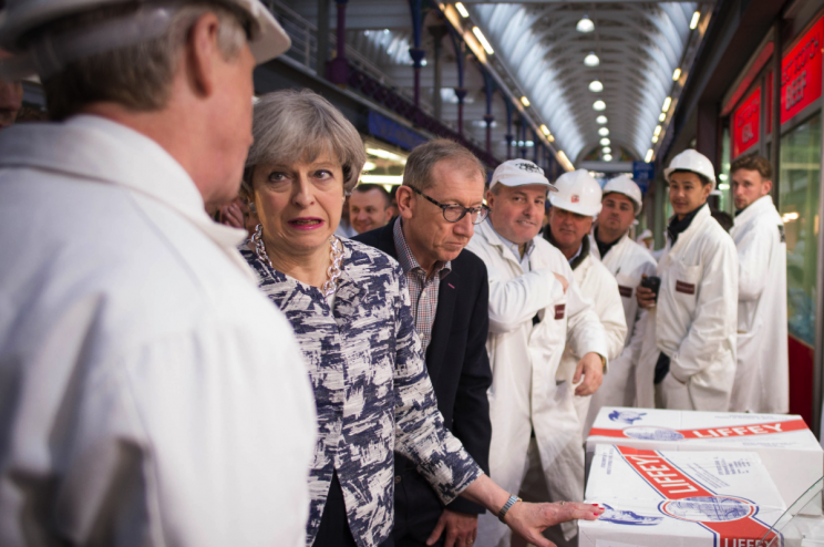 Theresa spoke to butchers at Smithfields (Picture: PA)