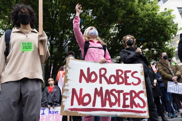 Reproductive rights advocates protested ahead of the decision with allusions to slavery. (Photo: JASON REDMOND via Getty Images)