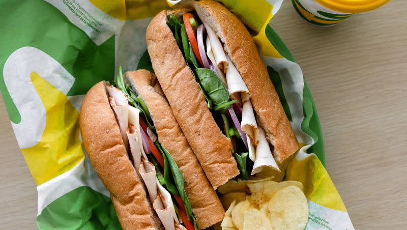 A picture of a turkey sub with potato chips from Subway. Subway is offering customers a footlong pass for the month of April. 