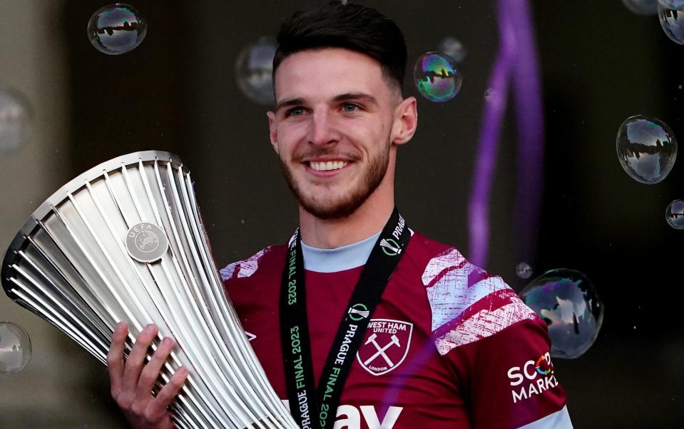 Declan Rice celebrates with the trophy at the Old Town Hall in Stratford, London, following Wednesday's 2-1 victory over Fiorentina in the Europa Conference League final