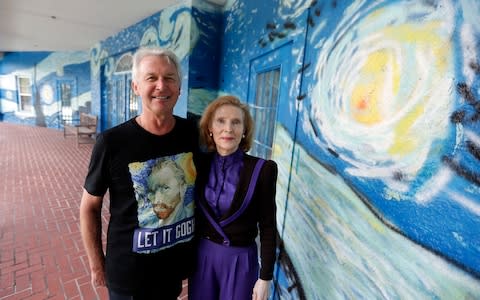 Lubomir Jastrzebski and Nancy Memhauseer said their mural helps calm their autistic son - Credit: John Raoux/AP