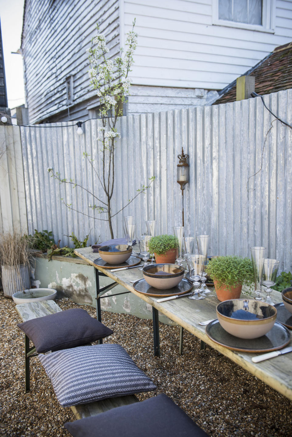 INCLUDE UNUSUAL MATERIALS FOR YOUR BUDGET GARDEN IDEAS