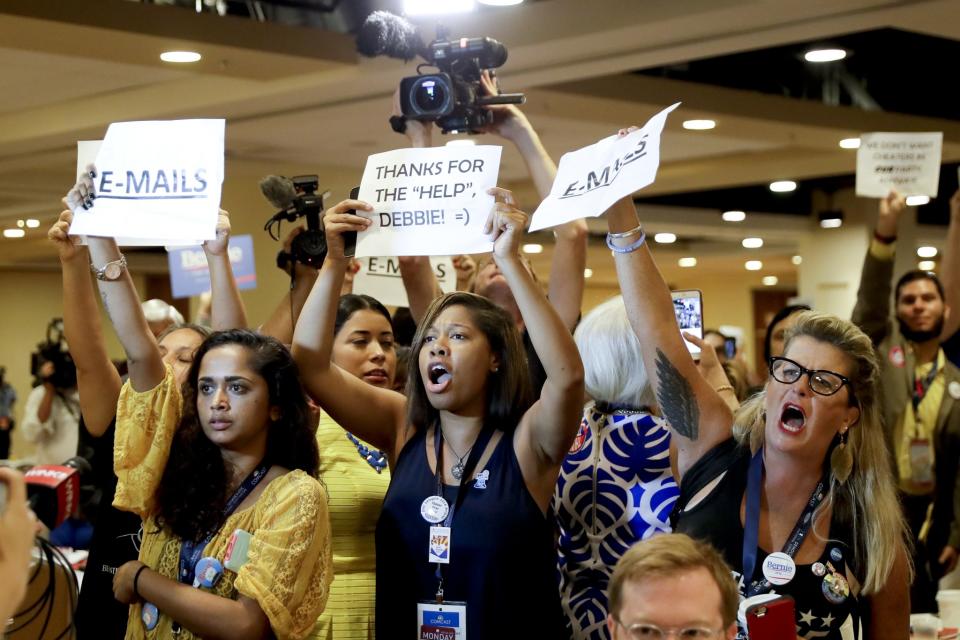 Protesters yell as Debbie Wasserman Schultz arrives for a Florida delegation breakfast on Monday in Philadelphia. (Photo: Matt Slocum/AP)