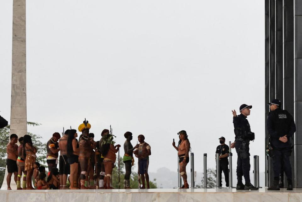 Indigenous people supporting Jair Bolsonaro protest in front of the Supreme Court in Brasilia on Sunday (REUTERS)