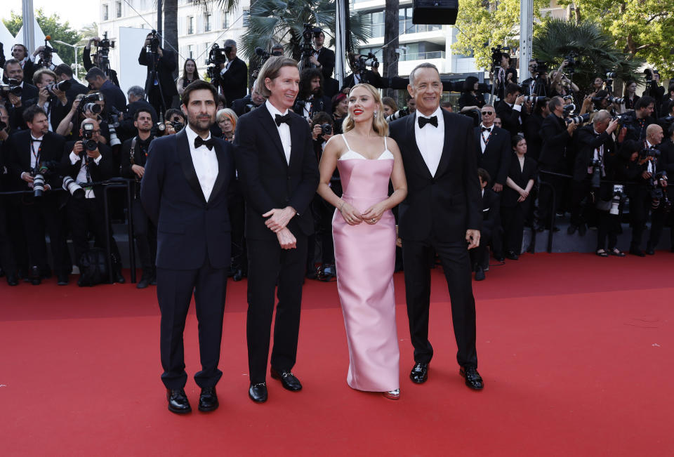 Jason Schwartzman, from left, director Wes Anderson, Scarlett Johansson and Tom Hanks pose for photographers upon arrival at the premiere of the film 'Asteroid City' at the 76th international film festival, Cannes, southern France, Tuesday, May 23, 2023. (Photo by Joel C Ryan/Invision/AP)
