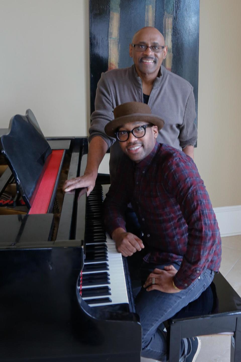 This Dec. 26, 2013 photo shows Bishop Paul Morton, background, and his son PJ Morton in New Orleans. The Mortons are nominated for best gospel album for “Best Days Yet,” the elder Morton’s album where PJ wrote and produced four songs. PJ’s song, the Stevie Wonder-featured “Only One,” is also up for best R&B song. The Mortons are the first to accomplish the feat since Bob and Jakob Dylan did so in 1998. (AP Photo/Doug Parker)