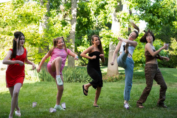 Ginger, Baby, Posh, Anna as Sporty and Maya as Scary, while still clad in the flip-flops. Photo: <em>Alex Lombardi/Courtesy of Hulu</em>