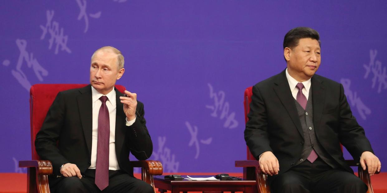 Vladimir Putin and Xi Jinping