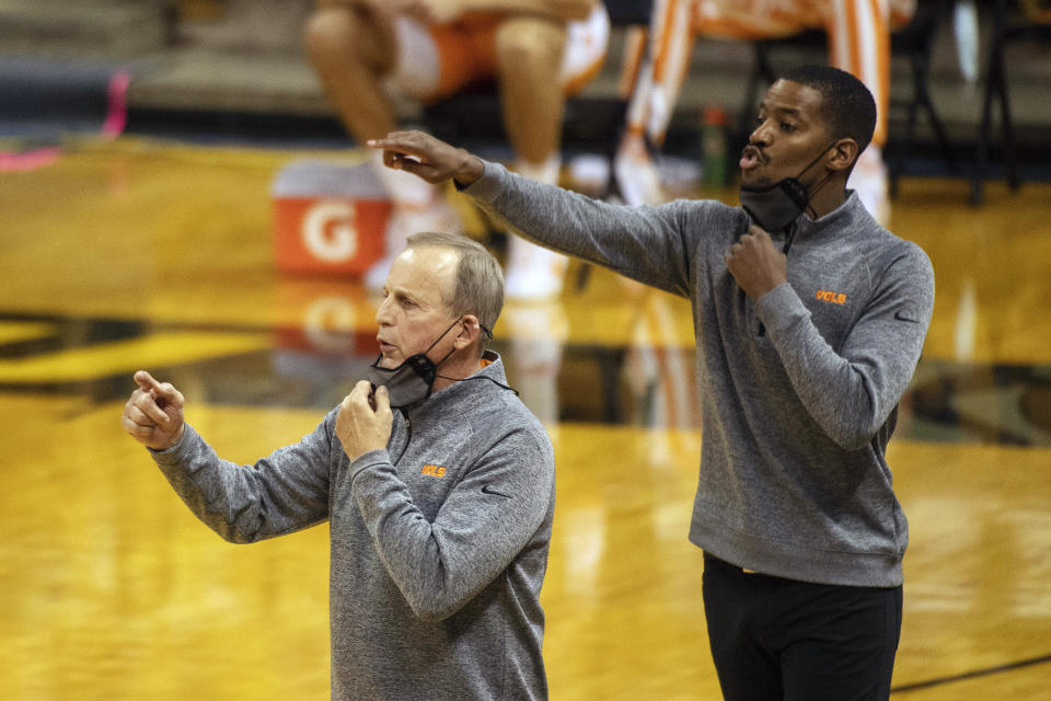 FILE - Tennessee head coach Rick Barnes, left, and assistant coach Kim English, right, position their players during the first half of an NCAA college basketball game against Missouri in Columbia, Mo., in this Wednesday, Dec. 30, 2020, file photo. Former NBA player and college assistant Kim English was hired to coach George Mason's men's basketball team Tuesday, March 23, 2021, exactly a week after the school fired Dave Paulsen.(AP Photo/L.G. Patterson, File)