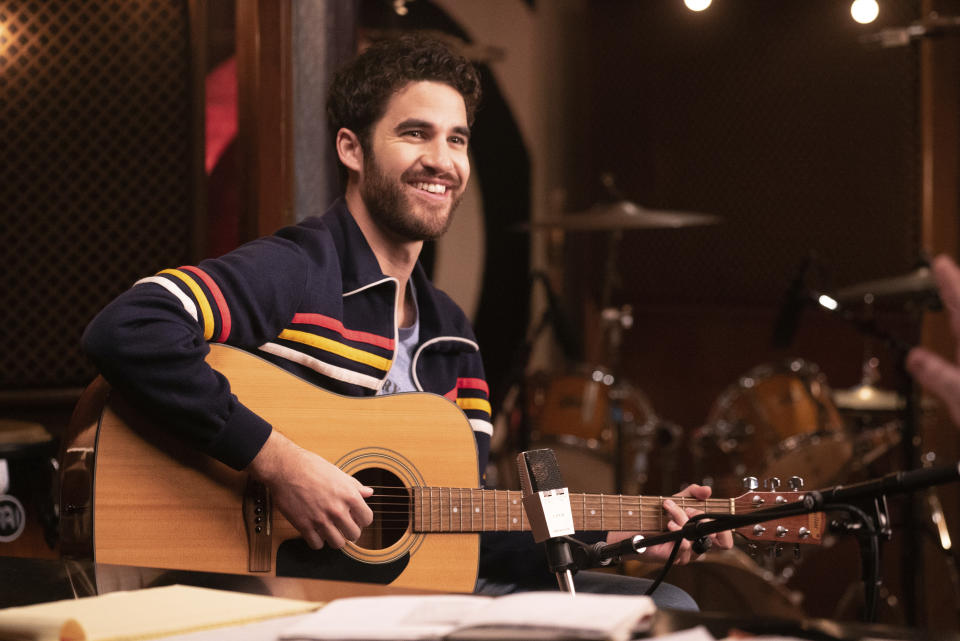 This image released by Quibi shows Darren Criss in a scene from Quibi's new 12-part series “Royalties." The satirical look at music industry has a fresh song in every episode and allows Criss to show off more than his acting chops: He wrote all the music, from a raunchy rap song to pure, irresistible pop. (Kevin Estrada/Quibi via AP)