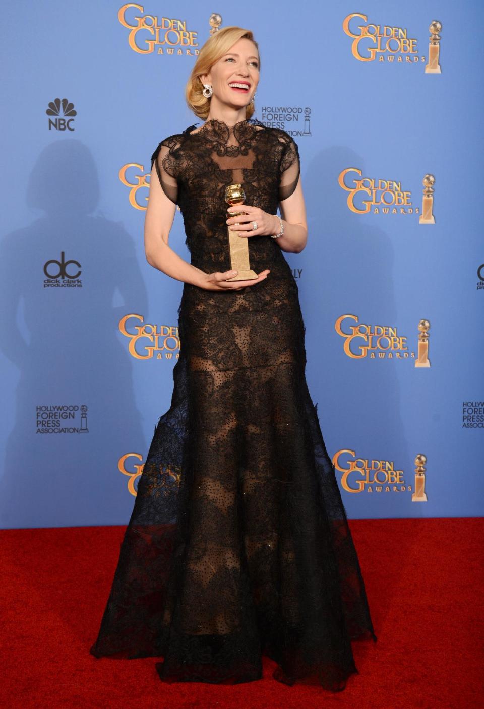 Cate Blanchett poses in the press room with the award for best actress in a motion picture - drama for "Blue Jasmine" at the 71st annual Golden Globe Awards at the Beverly Hilton Hotel on Sunday, Jan. 12, 2014, in Beverly Hills, Calif. (Photo by Jordan Strauss/Invision/AP)