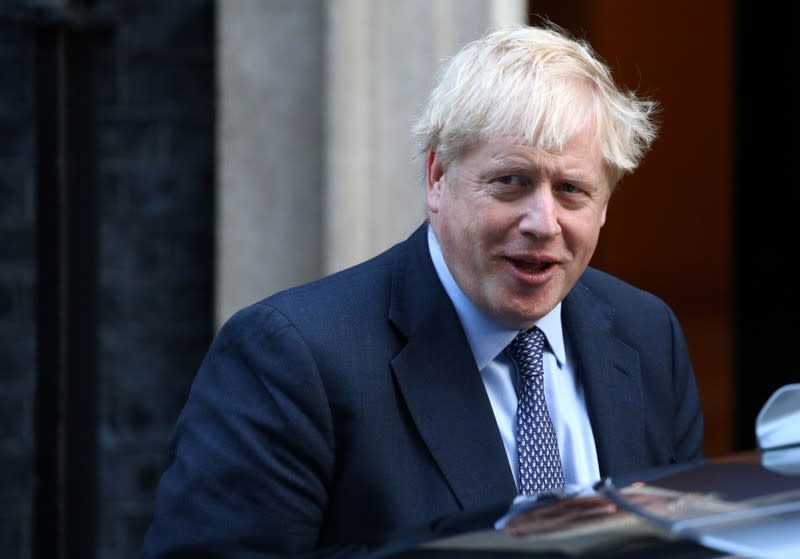 Britain's Prime Minister Boris Johnson leaves Downing Street to head for the House of Commons as parliament discusses Brexit, sitting on a Saturday for the first time since the 1982 Falklands War, in London