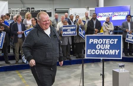 Former Toronto Mayor and current city Councillor Rob Ford arrives to show support for Canada's Prime Minister and Conservative leader Stephen Harper at a campaign rally at William F. White International Inc, a stage lighting equipment supplier in Etobicoke, a suburb of Toronto, October 13, 2015. REUTERS/Mark Blinch