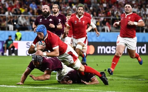 Justin Tipuric scores Wales' second try - Credit: ANNE-CHRISTINE POUJOULAT/AFP/Getty Images