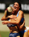 SYDNEY, AUSTRALIA - MARCH 16: Michelle Jenneke (R) of NSW celebrates with 2nd placegetter Abble Taddeo (L) of NSW after winning the Womens U20 100m Hurdles Final during day three of the Australian Junior Athletics Championships at Sydney Olympic Park Athletic Centre on March 16, 2012 in Sydney, Australia. (Photo by Matt King/Getty Images)