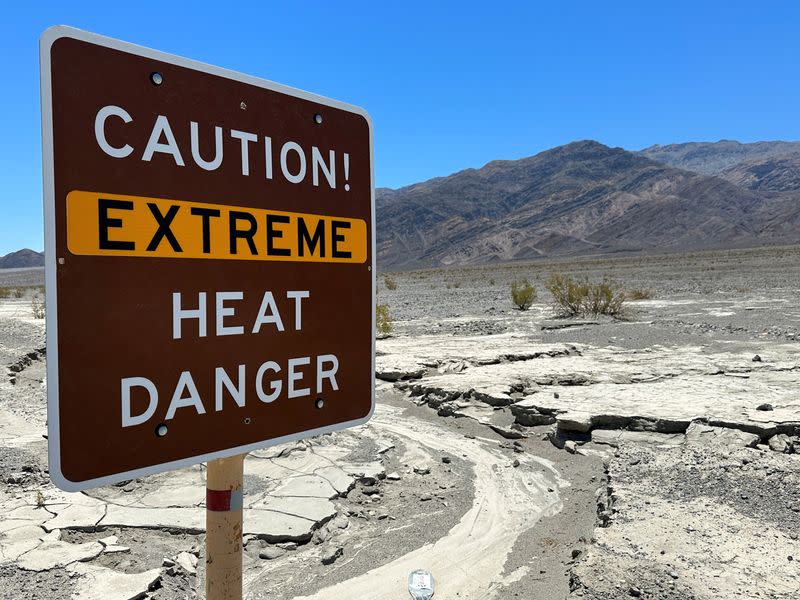 FILE PHOTO: View of sign board warning of extreme heat in Death Valley
