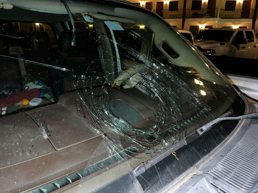 A truck in the parking lot of a hotel in Johnson City was damaged overnight in a storm May 9, 2024. (KXAN Photo/Todd Bailey)