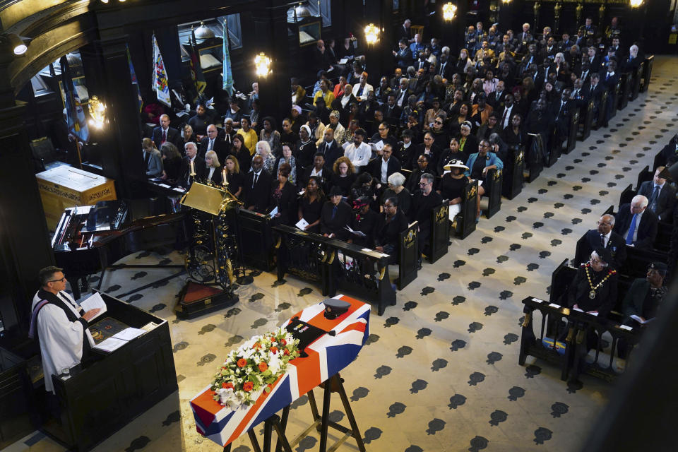 A view of the funeral service held for former RAF Sergeant Peter Brown, at St Clement Danes Church, in London, Thursday May 25, 2023. Jamaican Flight Sgt. Peter Brown who flew bombing missions in World War II after volunteering for the Royal Air Force died in December, aged 96. Volunteers tried to track down family and people who knew him. Word of that search drew interest from others who didn't want him to be forgotten for the service he offered in Britain's darkest hour. (Victoria Jones/PA via AP)